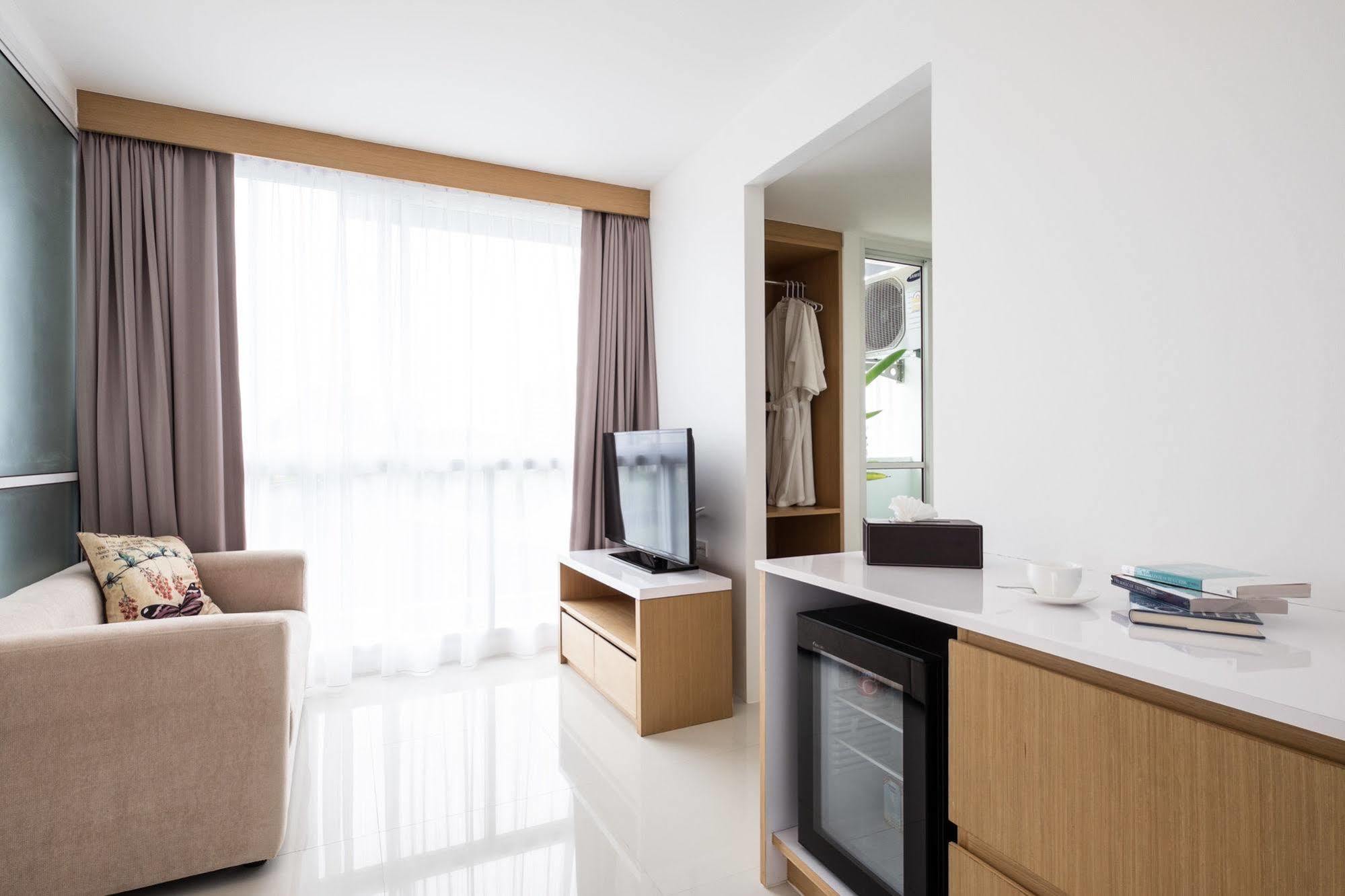 Modern Thai Suites Phuket Exterior photo